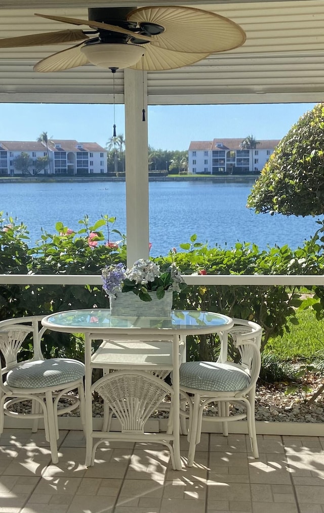 balcony featuring a water view