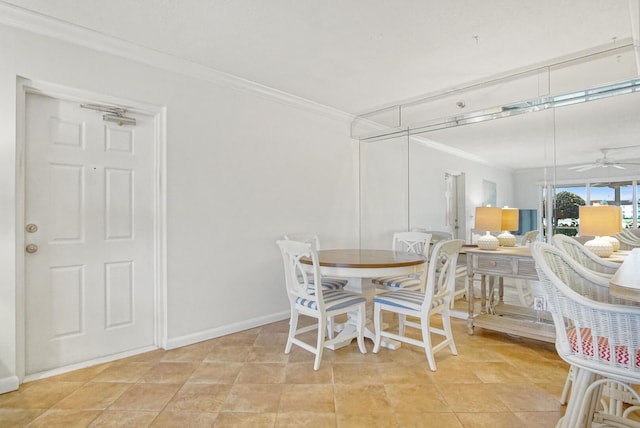 dining room featuring crown molding, ceiling fan, and light tile patterned flooring