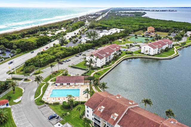 bird's eye view with a water view