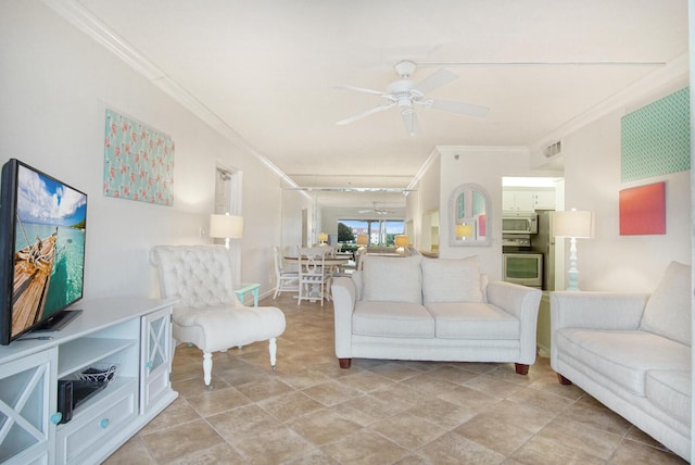 living room with ceiling fan and crown molding