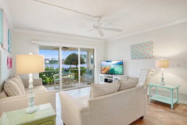 tiled living room featuring ceiling fan, a textured ceiling, and ornamental molding