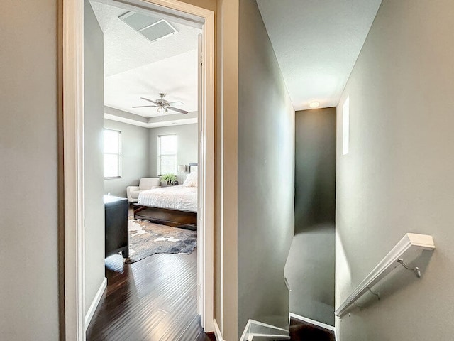 hall with dark hardwood / wood-style flooring