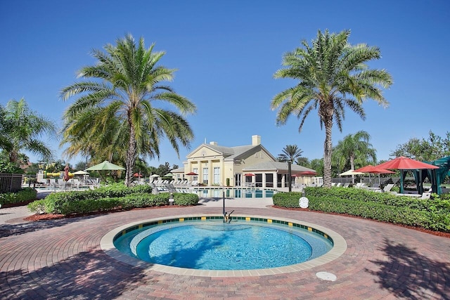 view of pool with a gazebo and a patio area