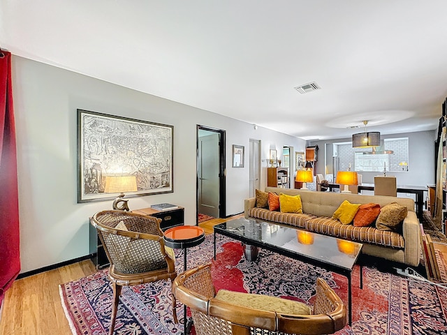 533 SE 28th Cir Unit 533, Boynton Beach, FL 33435 - living room featuring light wood-type flooring and baseboards