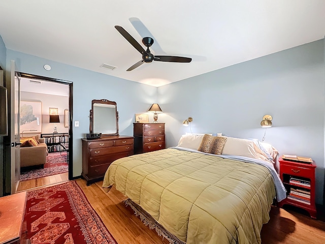 533 SE 28th Cir Unit 533, Boynton Beach, FL 33435 - bedroom featuring light wood finished floors and a ceiling fan