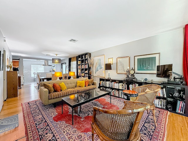 living room with light hardwood / wood-style floors