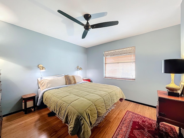 533 SE 28th Cir Unit 533, Boynton Beach, FL 33435 - bedroom featuring wood finished floors, ceiling fan, and baseboards