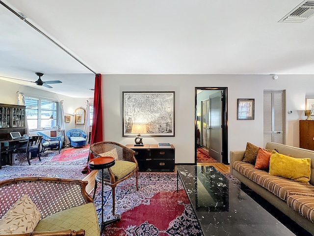 living room with ceiling fan