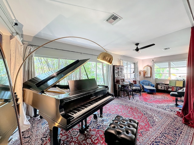 misc room with ceiling fan