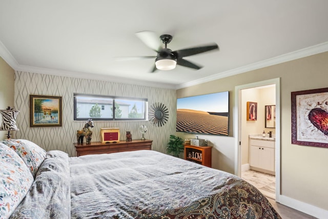 bedroom featuring wallpapered walls, baseboards, ornamental molding, ensuite bathroom, and a ceiling fan