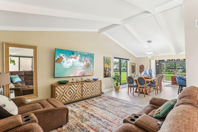 living room with light hardwood / wood-style flooring and vaulted ceiling with beams