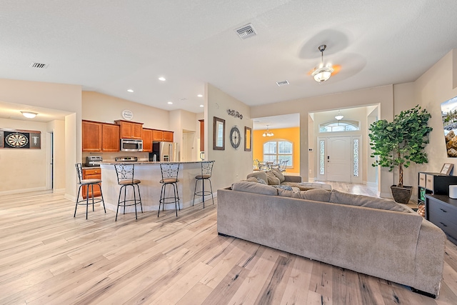 living room with light hardwood / wood-style flooring