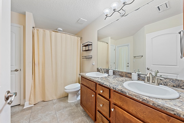 bathroom featuring vanity, a textured ceiling, an inviting chandelier, tile patterned flooring, and toilet