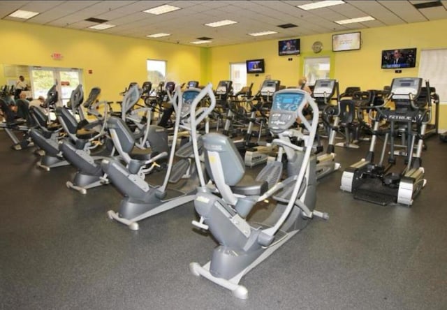 206 Dorchester Unit I, West Palm Beach, FL 33417 - exercise room featuring a drop ceiling