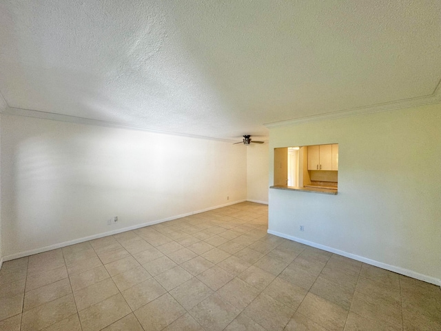 empty room with ornamental molding, a textured ceiling, and ceiling fan