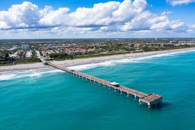 aerial view featuring a water view and a beach view