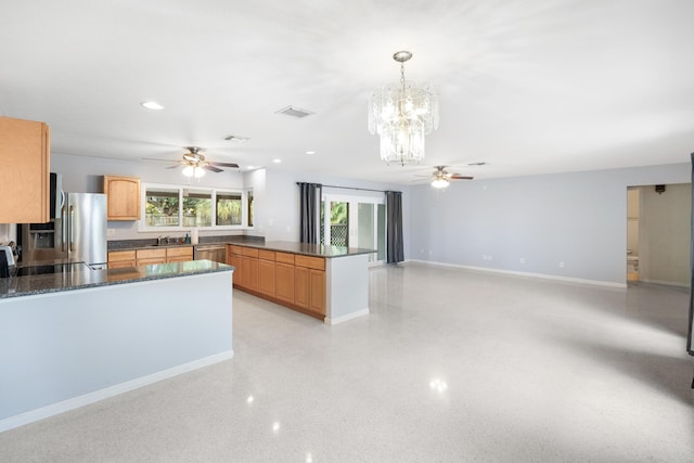 1413 SE San Sovina Ter, Port Saint Lucie, FL 34952 - kitchen featuring appliances with stainless steel finishes, ceiling fan, a peninsula, a chandelier, and recessed lighting