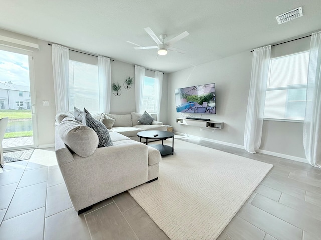 living room with ceiling fan