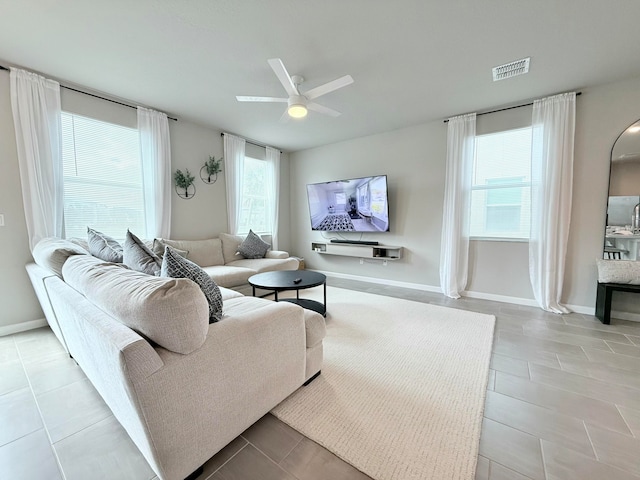 living room with ceiling fan