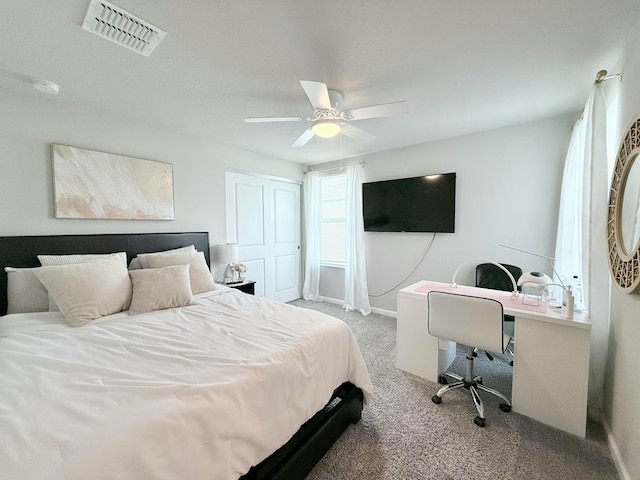 carpeted bedroom with ceiling fan