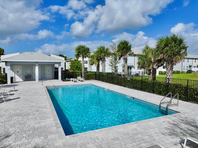 view of swimming pool featuring a patio