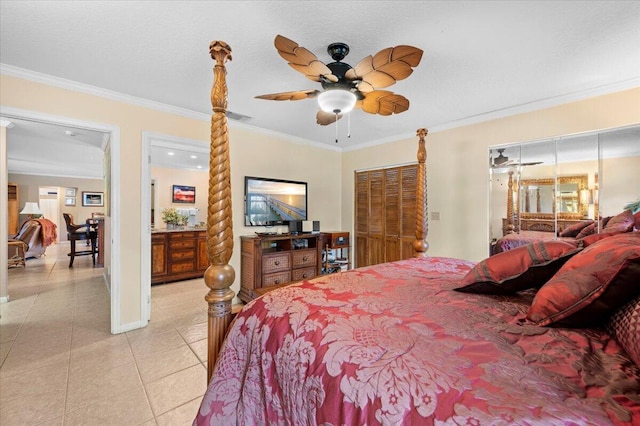 tiled bedroom featuring ceiling fan and crown molding