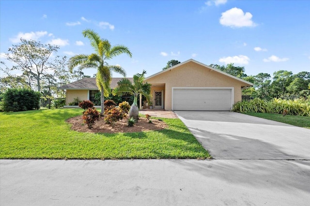 ranch-style home featuring a garage and a front yard