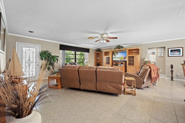 tiled living room with a textured ceiling, ceiling fan, and crown molding