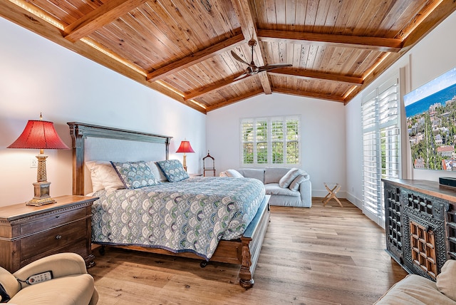 bedroom with wood ceiling, light wood-type flooring, and lofted ceiling with beams