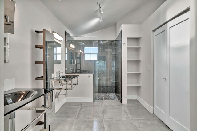 bathroom featuring an enclosed shower