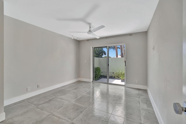 unfurnished room featuring ceiling fan