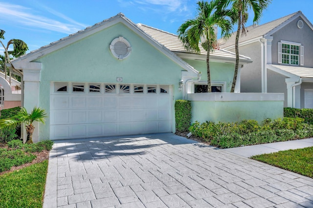 3 Dorchester Cir, Palm Beach Gardens, FL 33418 - entrance to property with fence and stucco siding