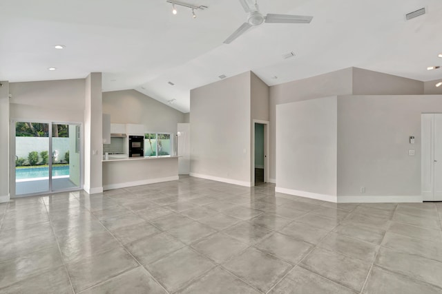 unfurnished living room featuring ceiling fan, light tile patterned flooring, and high vaulted ceiling