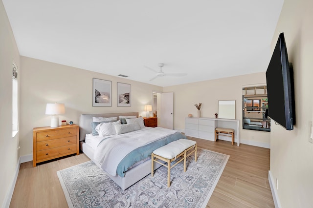 bedroom featuring ceiling fan and light hardwood / wood-style floors