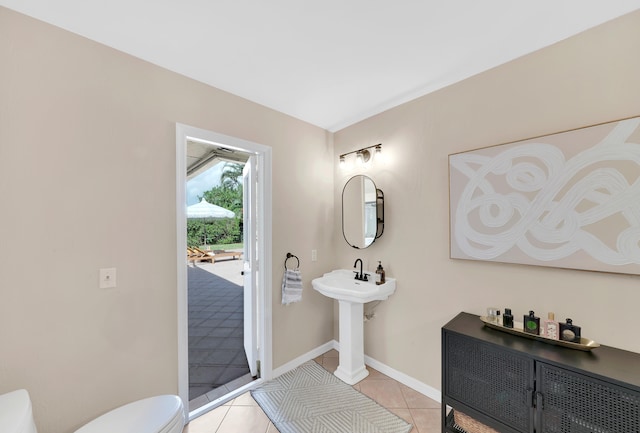 bathroom featuring tile patterned floors and toilet