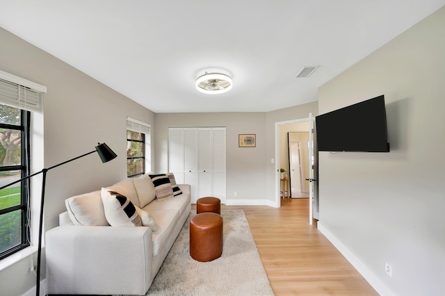 living room with light hardwood / wood-style floors