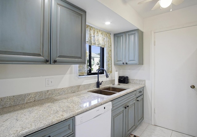 2400 S Ocean Dr Unit 6112, Fort Pierce, FL 34949 - kitchen with a sink, white dishwasher, gray cabinetry, and a ceiling fan
