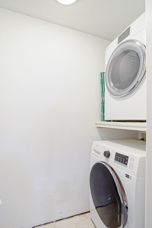 2400 S Ocean Dr Unit 6112, Fort Pierce, FL 34949 - laundry area with stacked washing machine and dryer