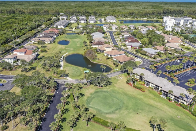 2400 S Ocean Dr Unit 6112, Fort Pierce, FL 34949 - aerial view of property and surrounding area featuring a large body of water, a golf club, a heavily wooded area, and nearby suburban area