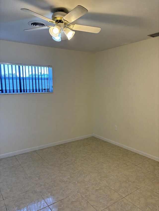 unfurnished room featuring ceiling fan