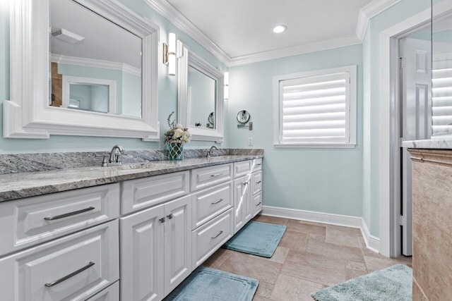 bathroom featuring vanity and crown molding