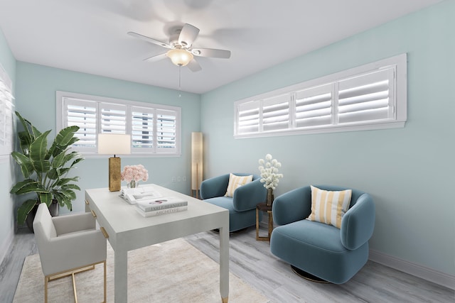 office area with ceiling fan and light wood-type flooring