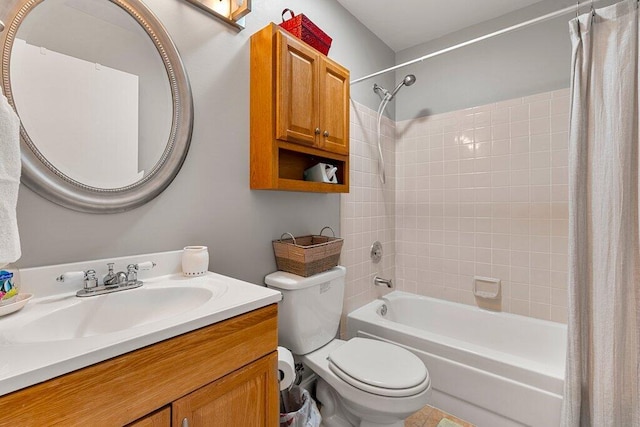 full bathroom featuring vanity, toilet, and shower / bath combination with curtain