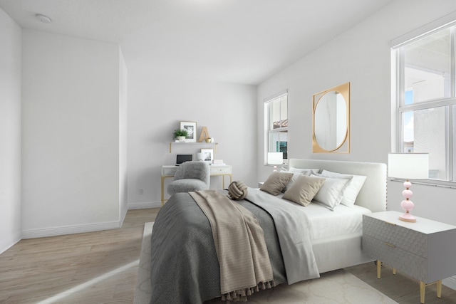 bedroom featuring light wood-type flooring