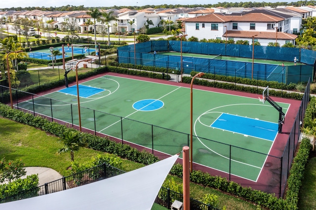 view of sport court with tennis court