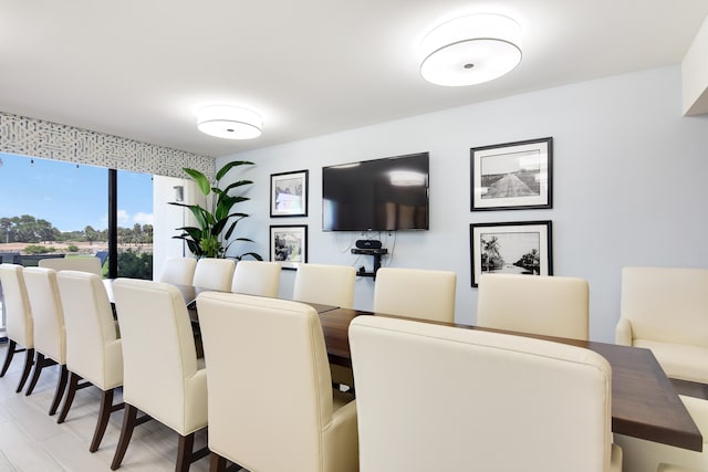 dining area with light hardwood / wood-style floors