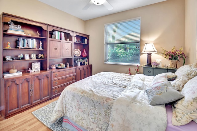 bedroom featuring ceiling fan and light hardwood / wood-style flooring