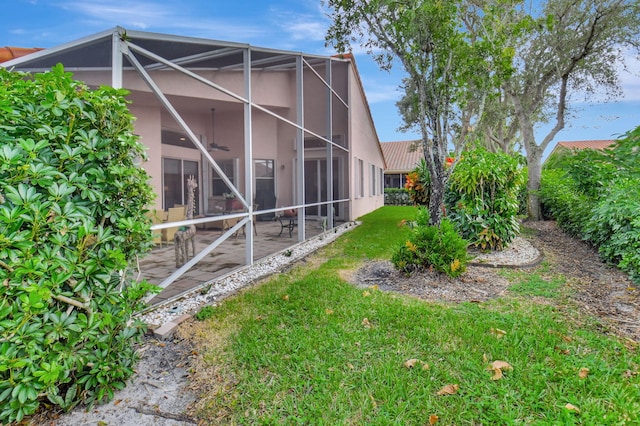 view of yard with a lanai