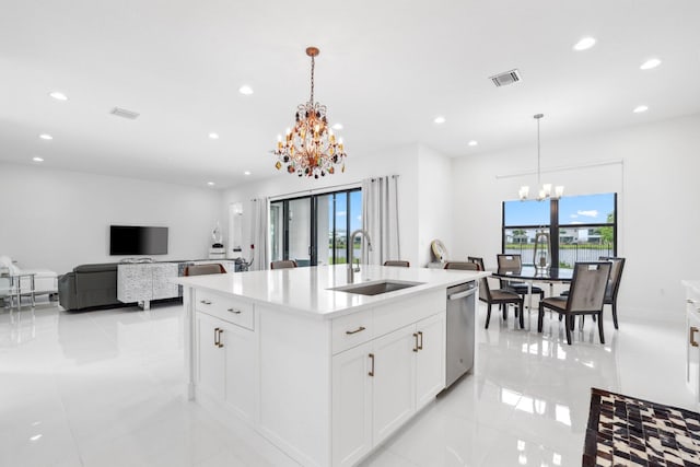 kitchen with visible vents, a sink, an inviting chandelier, stainless steel dishwasher, and recessed lighting