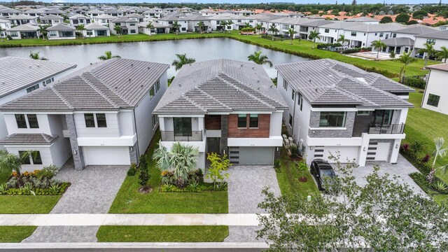 aerial view with a residential view and a water view